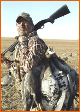Jeff Foiles with bag of Spec's