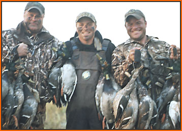 D&J Marshwetz & Guide Clint Reiser with limit of big Mallards